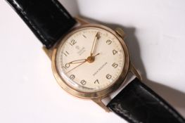 VINTAGE 9CT TUDOR ROYAL WRIST WATCH 1953, circular cream dial qith arabic numeral hour markers, 30mm