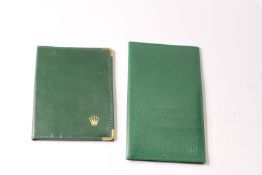 2x Rolex Leather Wallets, one green with gilt corner detail, 14.5x10.5cm, the other green lizard