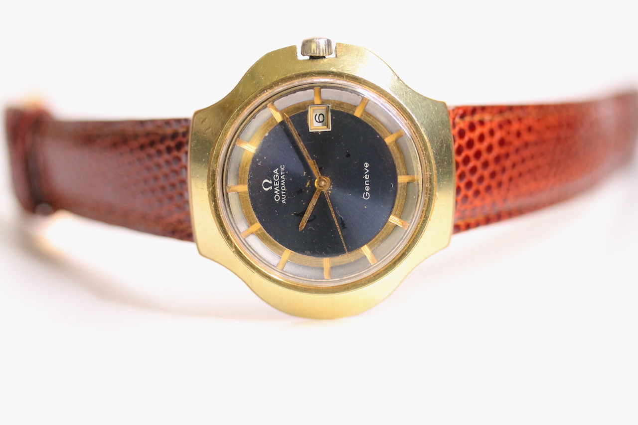 VINTAGE OMEGA AUTOMATIC GENEVE STINGRAY / COBRA REFERENCE 166.121, circular blue and gold two tone