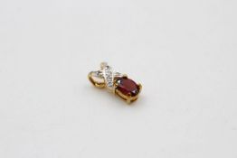 9ct Gold garnet & diamond detail pendant 2.2 grams gross