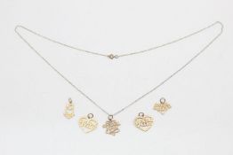 5 x 9ct gold sentimental pendants and chain 2.6 grams gross