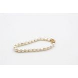 14ct gold and pearl bracelet 10 grams gross