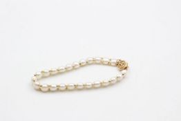 14ct gold and pearl bracelet 10 grams gross