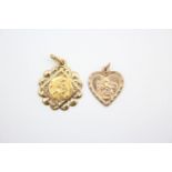 2 x 9ct gold st christopher pendants 1.7 grams gross