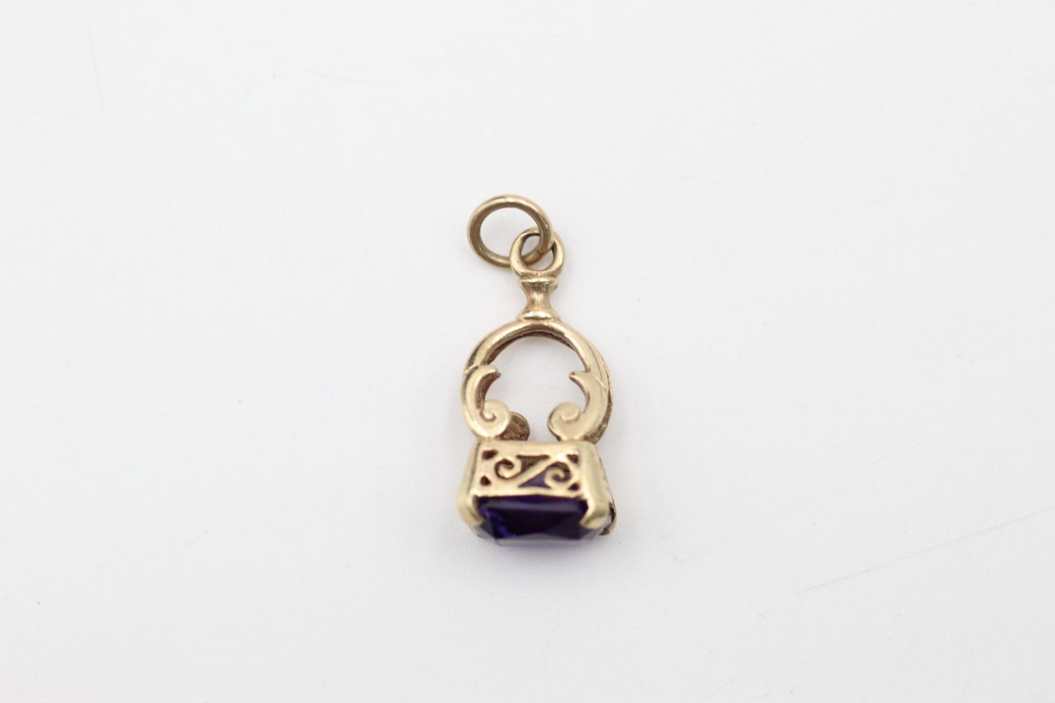 9ct Gold amethyst ornate fob pendant 2.1 grams gross - Image 5 of 5