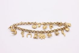 9ct gold charm bracelet with 15 charms 8.3 grams gross