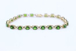 9ct gold Green gemstone line bracelet 9.5 grams gross