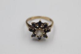 9ct gold stone set floral cluster ring 2.6 grams gross