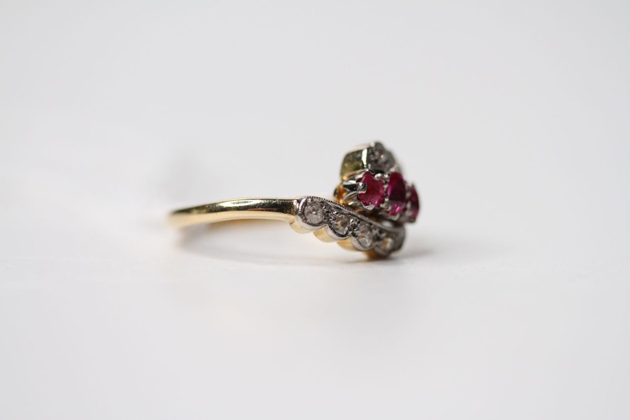 Ruby & Diamond 3 Line Twist Ring, stamped 18ct yellow gold, size P1/2, 3.6g. - Image 2 of 3