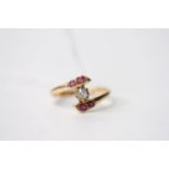 Ruby & Diamond Twist Ring, stamped 18ct yellow gold, size O, 2.6g.