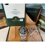 SUPER RARE NOS ROLEX SUBMARINER WRISTWATCH REF 16610 W/BOX & PAPERS, circular black dial with hour