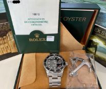 SUPER RARE NOS ROLEX SUBMARINER WRISTWATCH REF 16610 W/BOX & PAPERS, circular black dial with hour