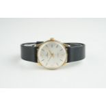 GENTLEMENS GARRARD 9CT GOLD AUTOMATIC WRISTWATCH, circular silver dial with stick hour markers and