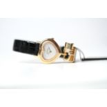 LADIES 18CT CORUM HEART SHAPED DIAMOND BEZEL QUARTZ WATCH, heart shaped mother of pearl dial with