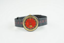 GENTLEMENS FERRARI BY CARTIER WRISTWATCH, circular red dial with stick hour markers and hands,