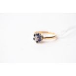Sapphire & Diamond Flower Ring, stamped 18ct yellow gold, size K, 2.65g.