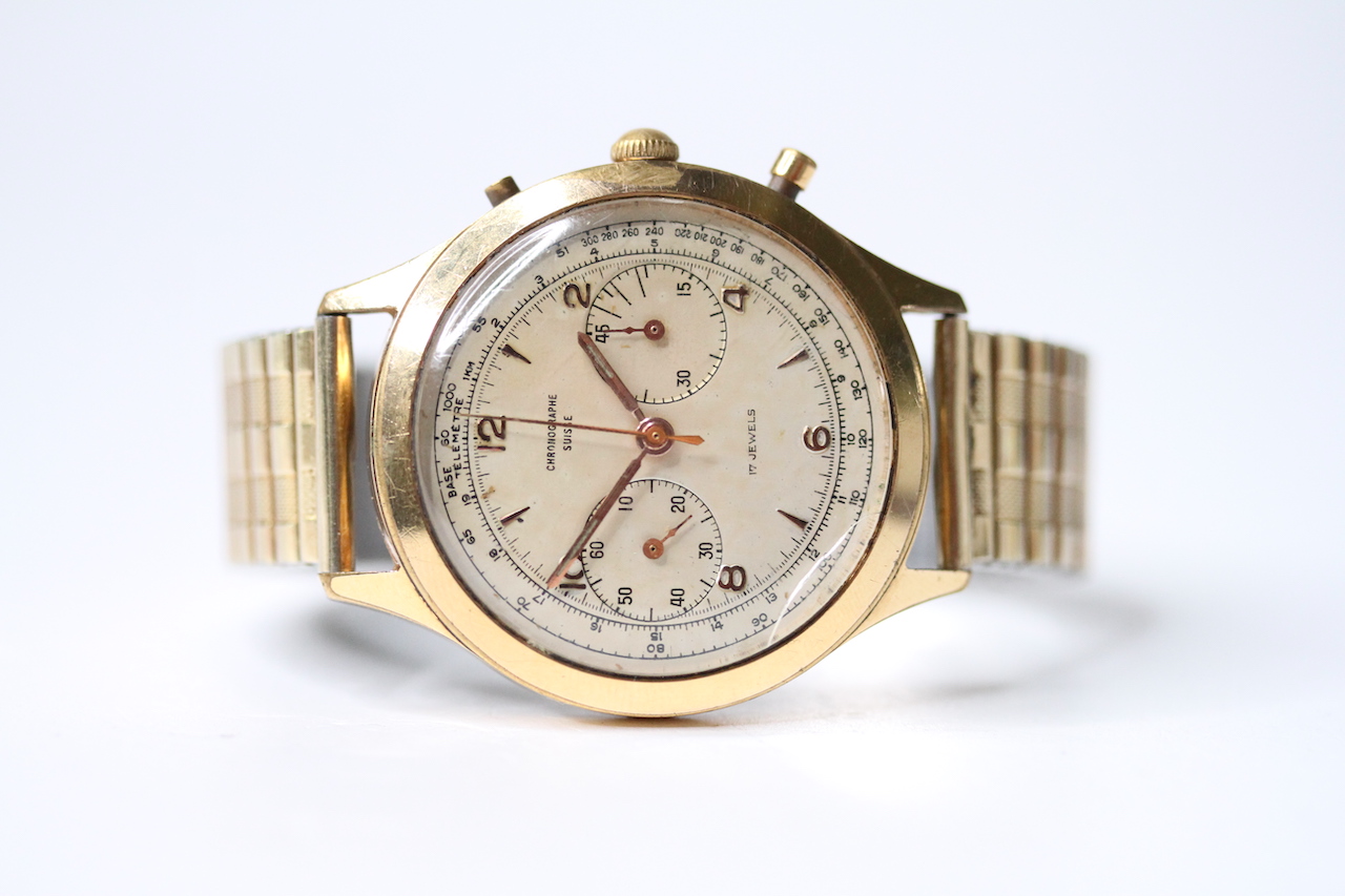 VINTAGE CHRONOGRAPHE SUISSE OVERSIZE, circular champagne dial with arabic numeral hour markers,