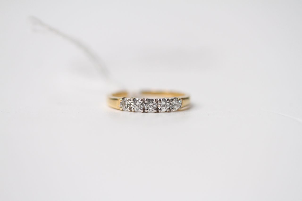 5 Stone Diamond Ring, stamped 18ct yellow gold, size I1/2, 1.5g.