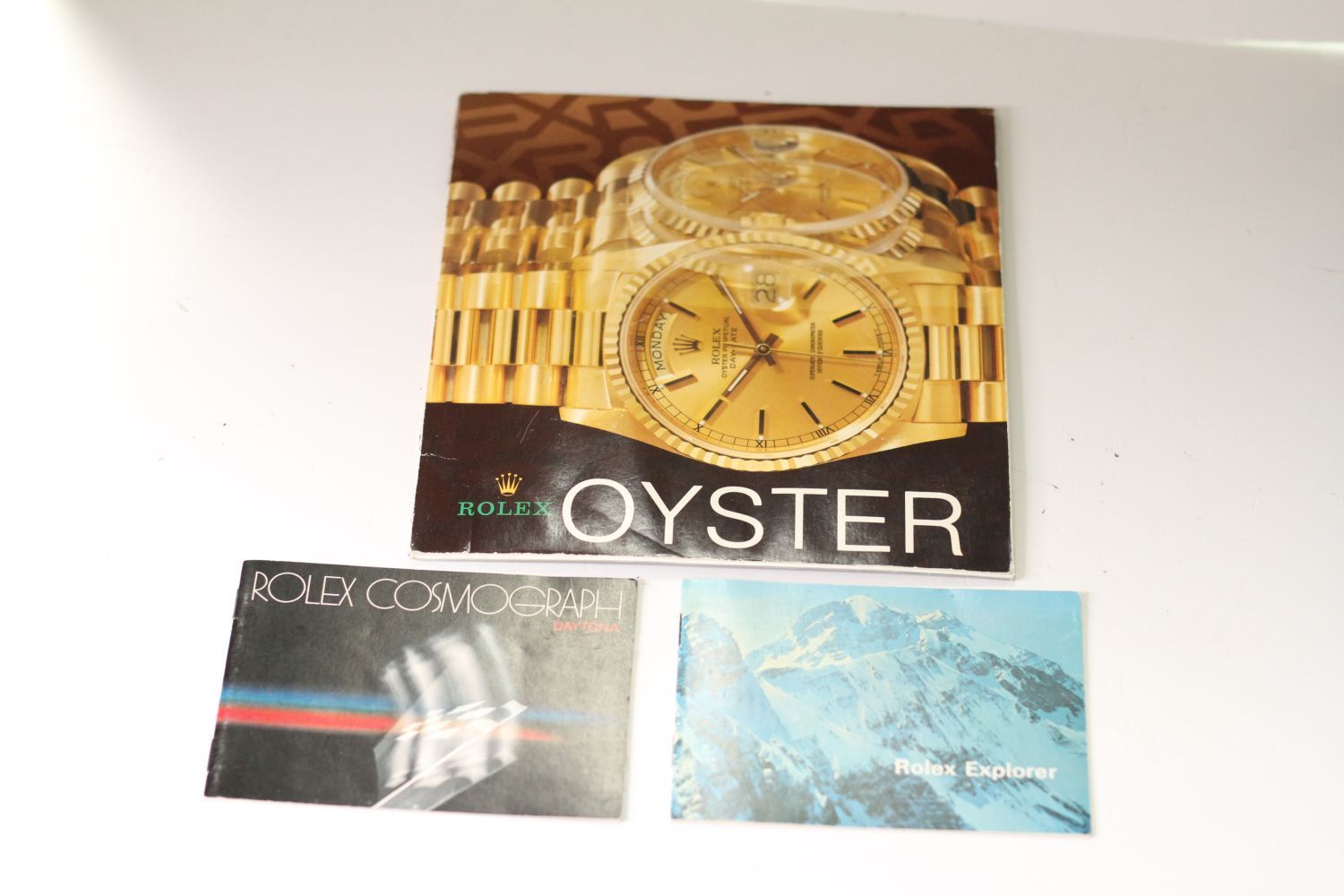 1981 Rolex Cosmograph Daytona booklet, 1980s Rolex Explorer booklet, Large Rolex Oyster Booklet