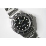 VINTAGE ROLEX SUBMARINER REFERENCE 5513 CIRCA 1975, circular black with applied hour markers,