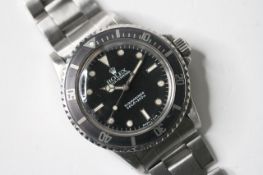 VINTAGE ROLEX SUBMARINER REFERENCE 5513 CIRCA 1975, circular black with applied hour markers,