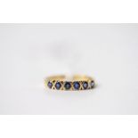 6 Stone Sapphire Ring, stamped 18ct yellow gold, G 1235, size N1/2.