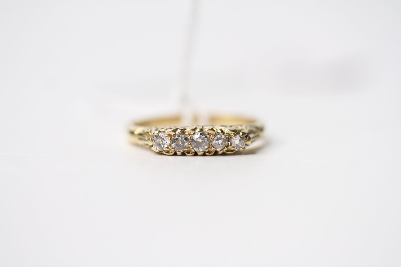 5 Stone Diamond Ring, stamped 18ct yellow gold, AJW, size Q1/2, 3.4g.