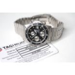 TAG HEUER 2000 CHRONOGRAPH WITH SERVICE PAPERS, circular black dial with baton hour markers, date