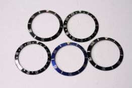 5x 1980s-1990s Rolex bezel inserts including, GMT, Submariner and Blue Bi Colour Submariner