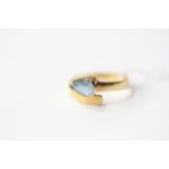 Aquamarine Twist Ring, stamped 18ct yellow gold, size N, 3.3g.