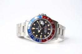 VINTAGE ROLEX GMT MASTER 'PEPSI' REFERENCE 1675, aftermarket circular black dial with dot hour