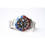 VINTAGE ROLEX GMT MASTER 'PEPSI' REFERENCE 1675, aftermarket circular black dial with dot hour