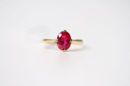 Ruby Solitaire Ring, oval cut ruby, claw set, stamped 18ct yellow gold, size O, 2.7g.