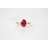 Ruby Solitaire Ring, oval cut ruby, claw set, stamped 18ct yellow gold, size O, 2.7g.