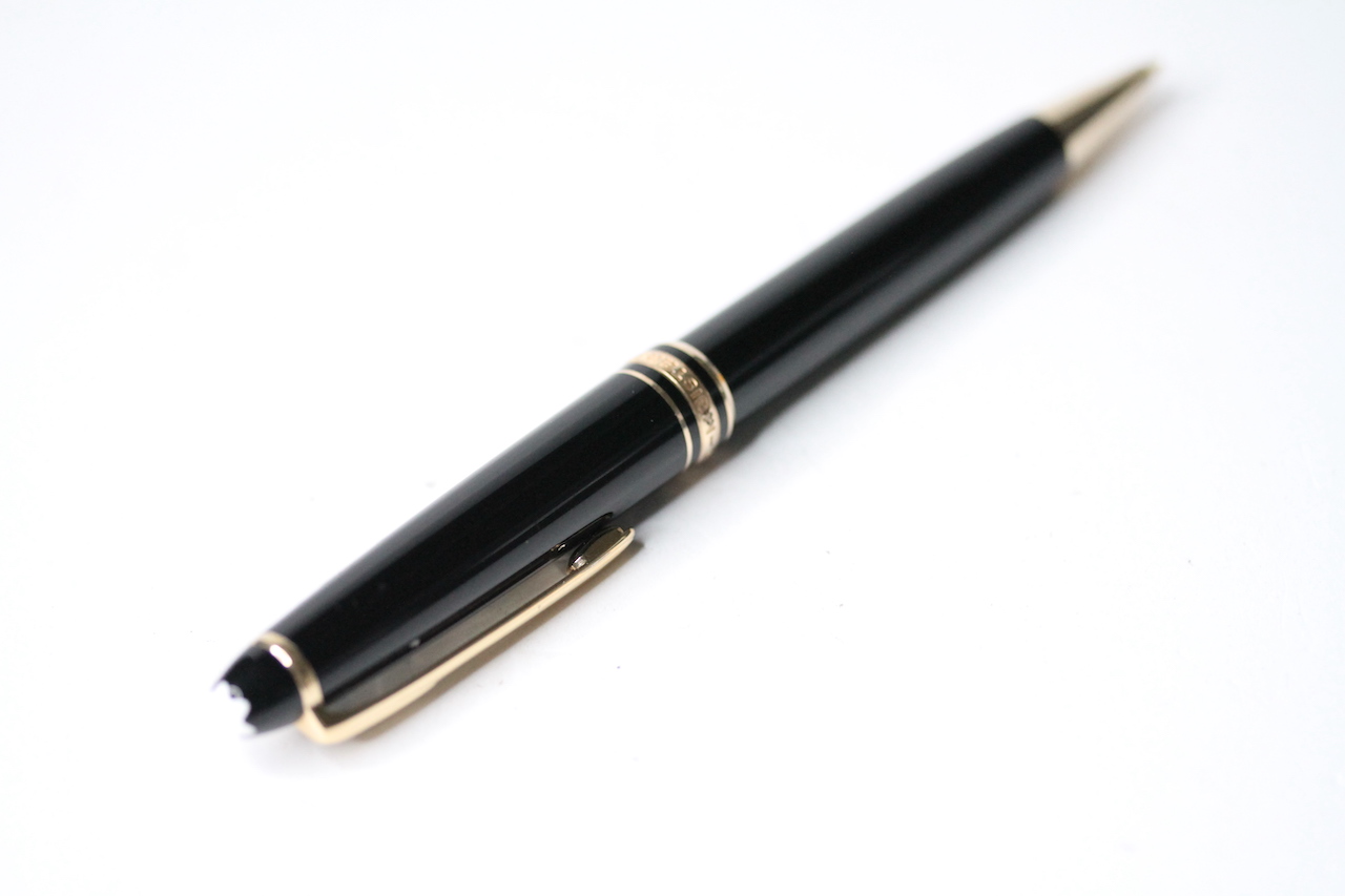 MONTBLANC MEISTERSTUCK PENCIL, black case with yellow gold accents, pencil led in tact and the - Image 2 of 2