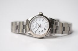 LADIES ROLEX OYSTER PERPETUAL 18CT FLUTED BEZEL, circular white dial with roman numeral hour