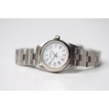 LADIES ROLEX OYSTER PERPETUAL 18CT FLUTED BEZEL, circular white dial with roman numeral hour