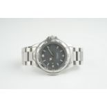 GENTLEMENS TAG HEUER PROFESSIONAL WRISTWATCH, circular grey dial with luminous green hour markers