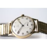 VINTAGE 9CT TUDOR MANUAL WIND WRIST WATCH, circular cream dial with arabic numeral hour markers,