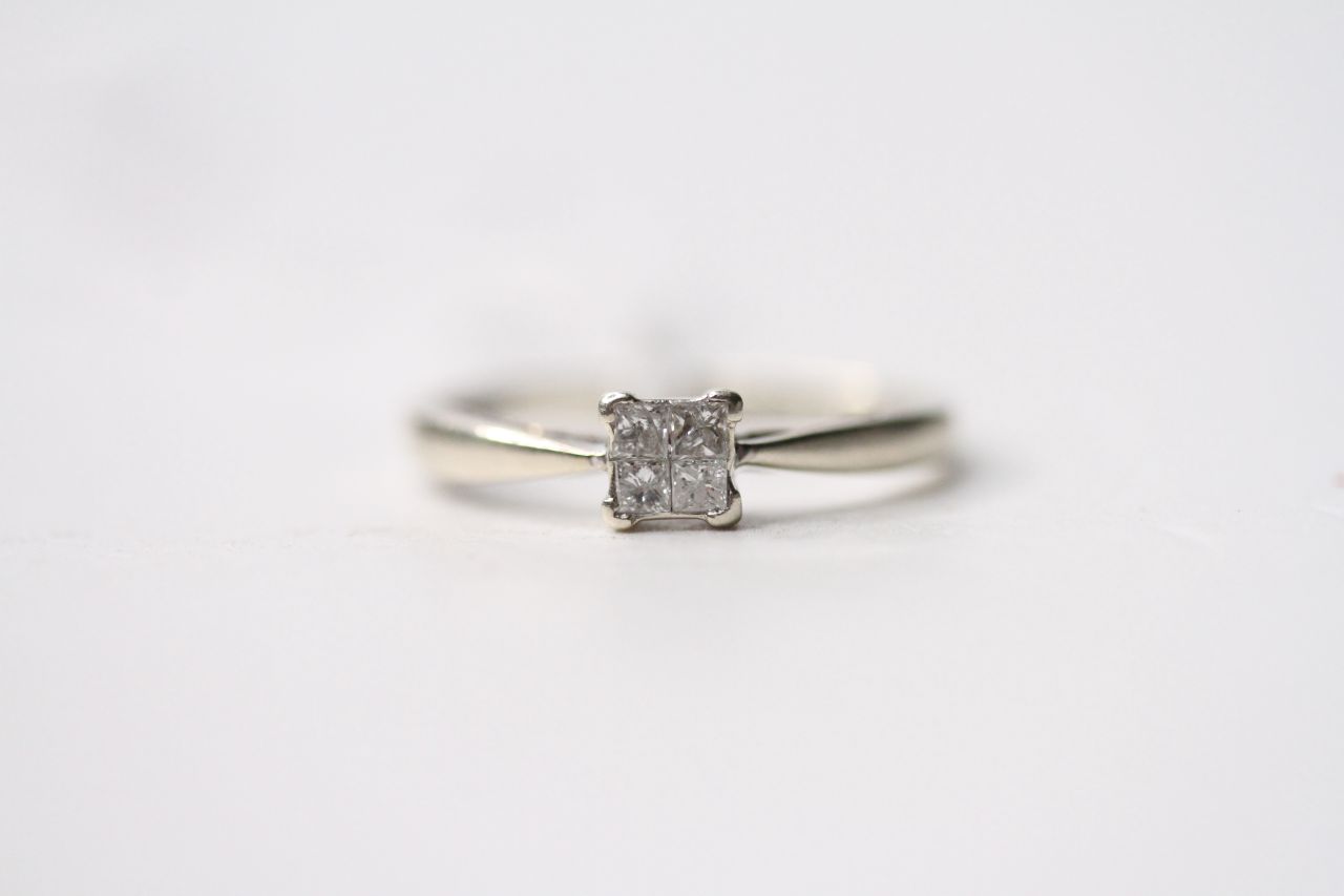 Princess Cut Diamond Ring, set with 4 princess cut diamonds, 9ct white gold, size N, 0.15ct total