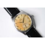 VINTAGE OMEGA MANUAL WIND WRIST WATCH, circular champagne patina dial with baton and arabic