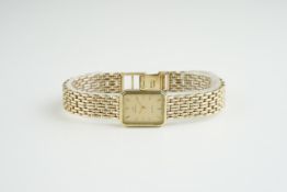 LADIES MARVIN DIAMOND 9CT GOLD COCKTAIL WATCH, rectangular two tone dial with stick hour markers and