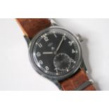 IWC MILITARY WWW WRIST WATCH, circular black dial with arabic numeral hour markers, subsidiary