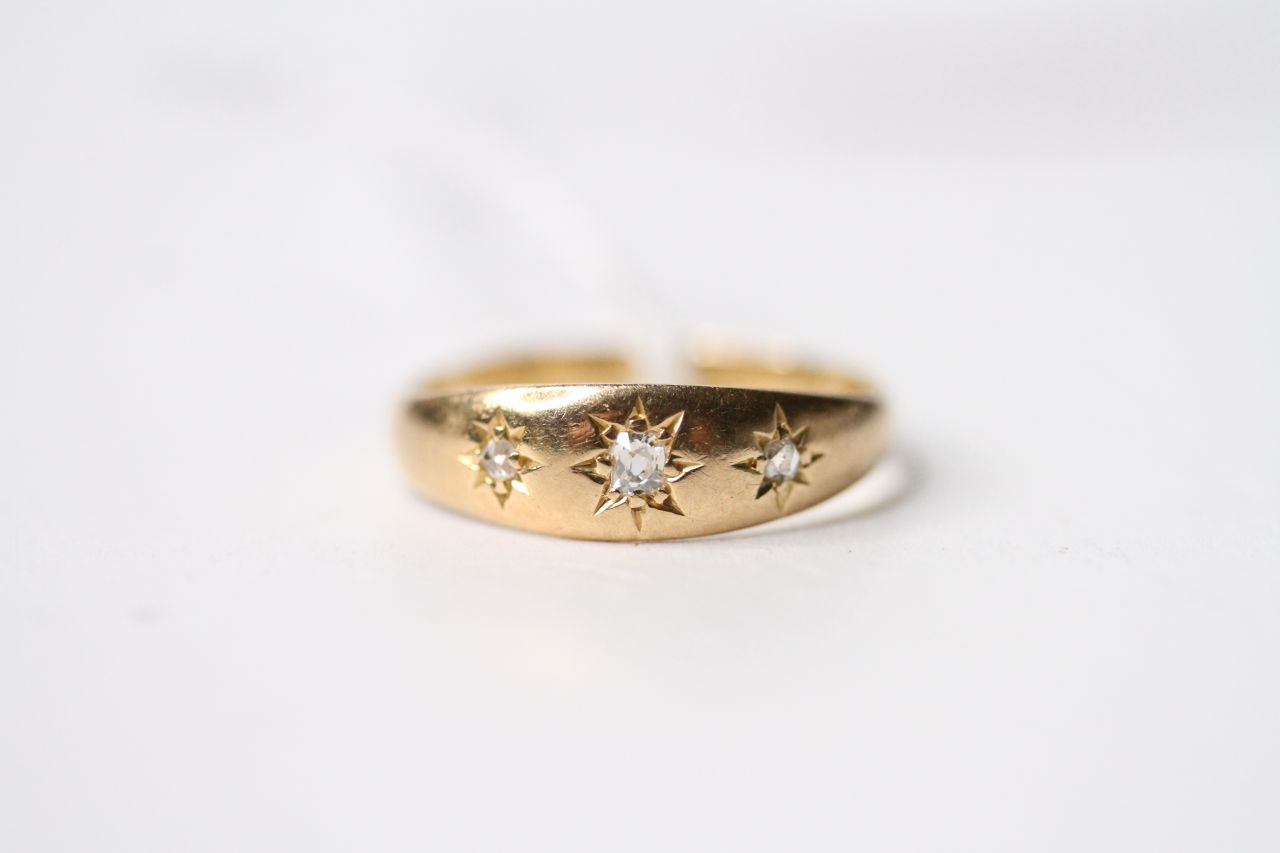 3 Stone Diamond Gypsy Ring, 18ct yellow gold, size Q, 3.4g.