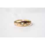 3 Stone Diamond Gypsy Ring, 18ct yellow gold, size Q, 3.4g.