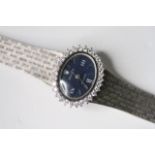 LADIES 18CT ROLEX PRECISION DIAMOND BEZEL CIRCA 1960s, oval blue dial with baton and roman numeral