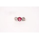 Ruby & Diamond 3 Stone Ring, set with a central ruby, claw set, 2 diamonds approximately 0.60ct