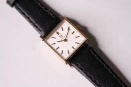 LADIES 9CT OMEGA WRIST WATCH, square white dial with gold baton hour markers, 18mm 9ct gold case,