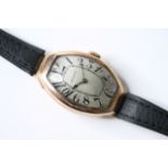 RARE 14CT OVERSIZED MOVADO TONNEAU CASED ART DECO WATCH CIRCA 1910-1920, exploding Roman numeral