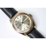 *TO BE SOLD WITHOUT RESERVE* CORNAVIN DAY DATE GOLD PLATED WRIST WATCH, circular champagne dial with